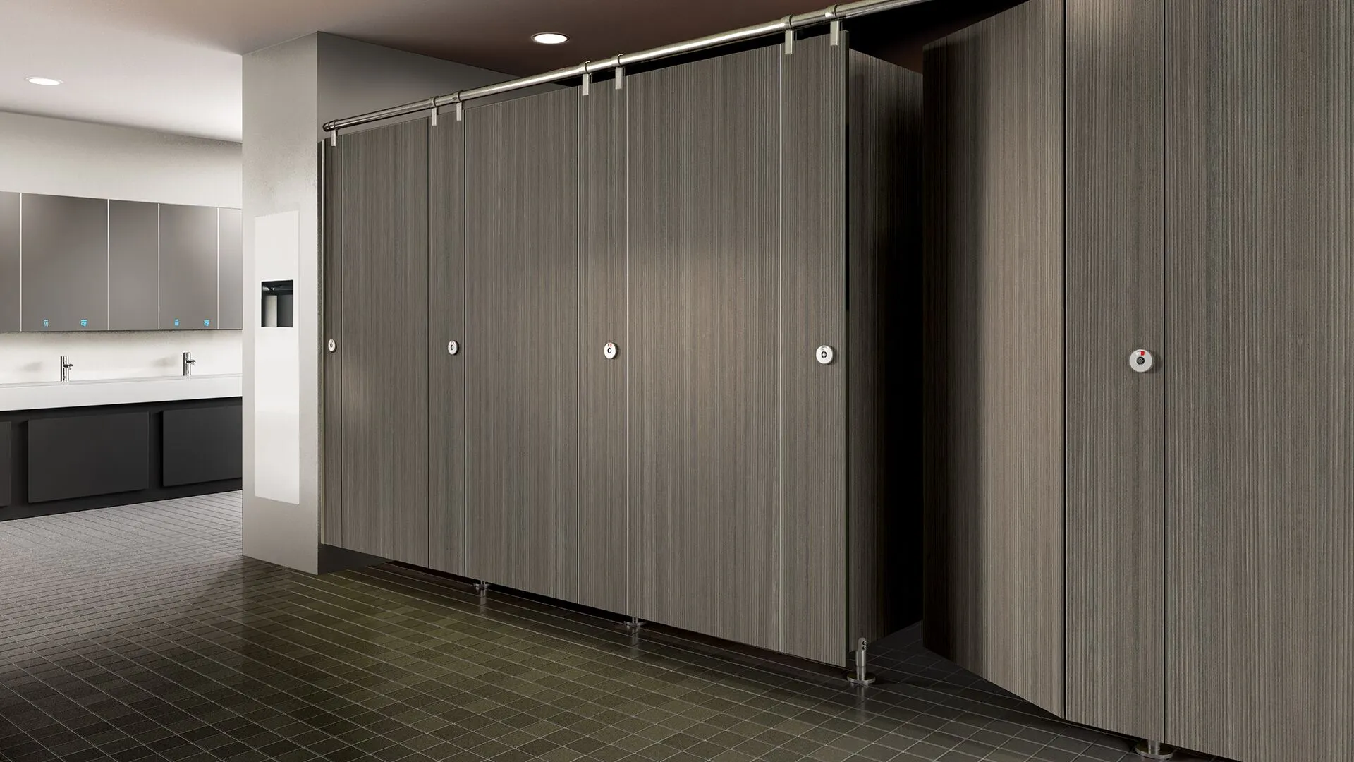 Commercial washroom featuring woodgrain partitions and stainless hardware